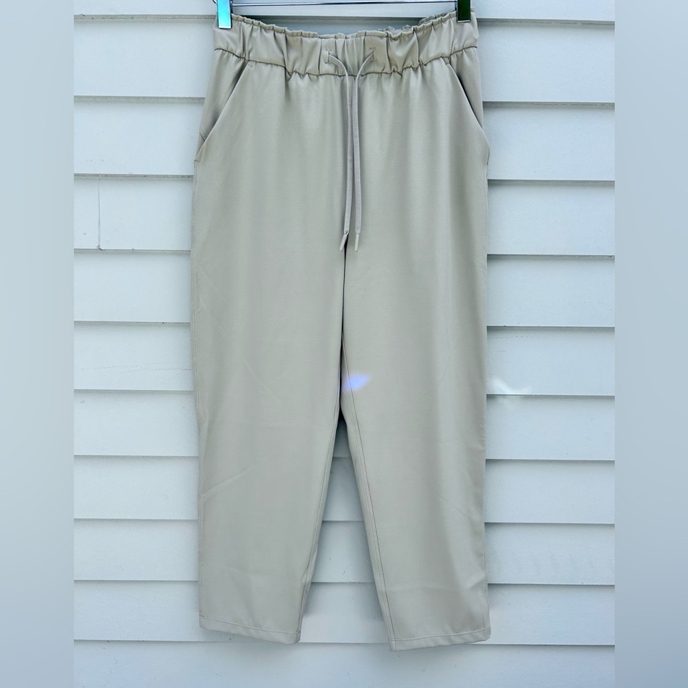 Lululemon - Drawstring Pant, Crop in Tan. Never worn. Size 8.